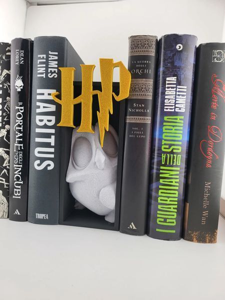 Декоративна книжкова підставка-розділювач &laquo;Магія Гоґвортсу&raquo; з емблемою Гаррі Поттера та фігуркою Добі &ndash; стильний та казковий аксесуар для книжкових полиць. Aivory id_12673 фото
